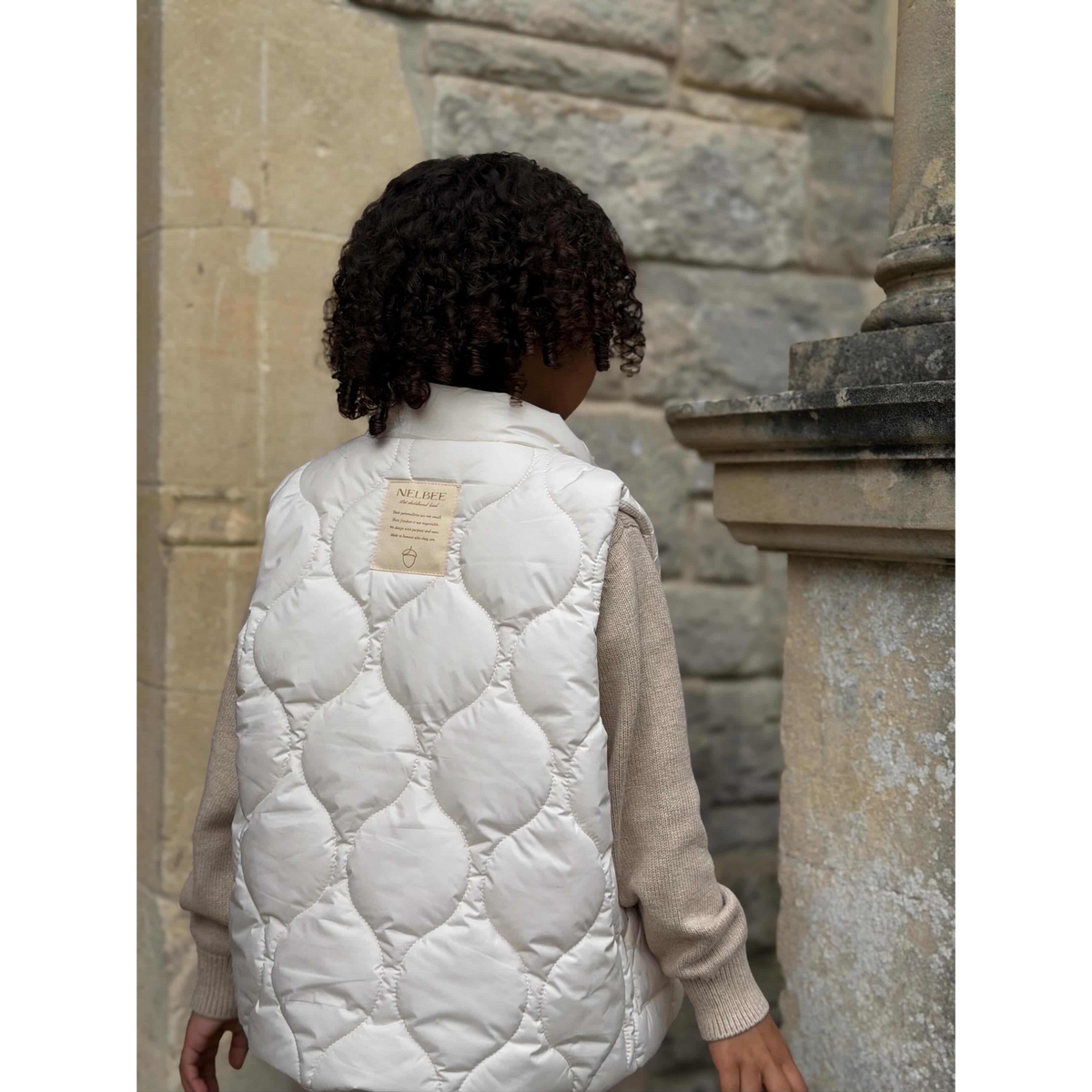 Kid_wearin_Creamy_NELBEE_Gilet_Vest